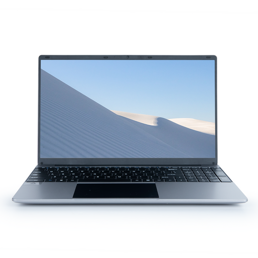 Silver laptop open with black keyboard; screen shows a desert sand dune landscape.