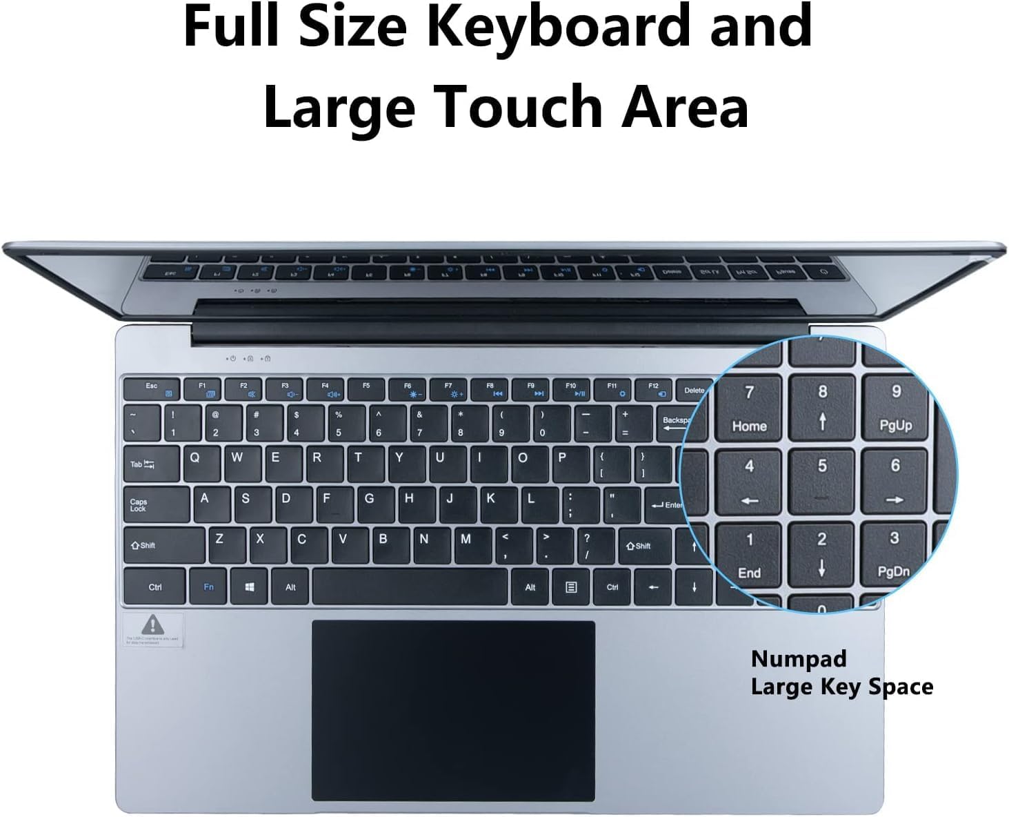 Laptop keyboard close-up with large touchpad and numpad on the right.