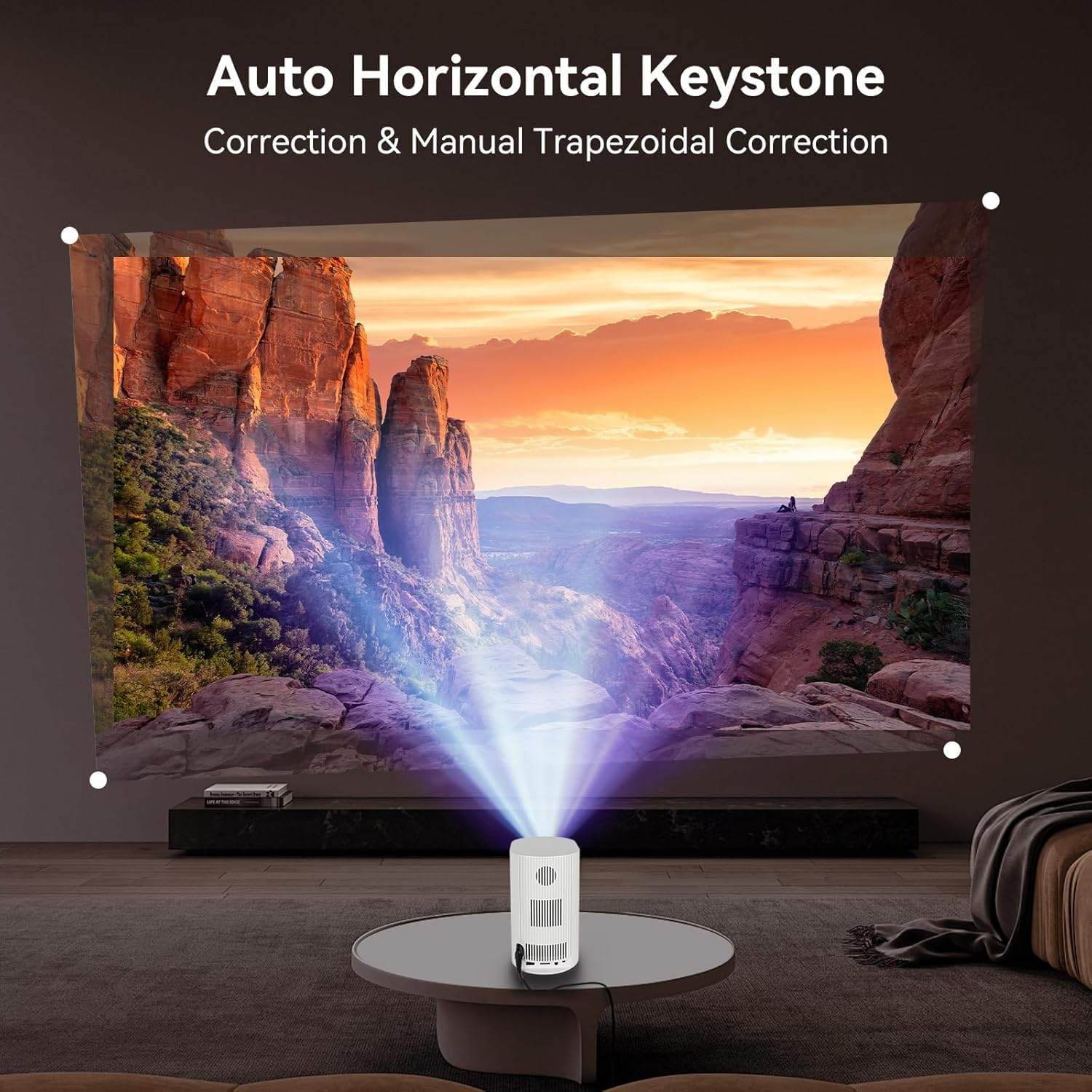 White portable projector projecting a trapezoid-shaped image on a screen