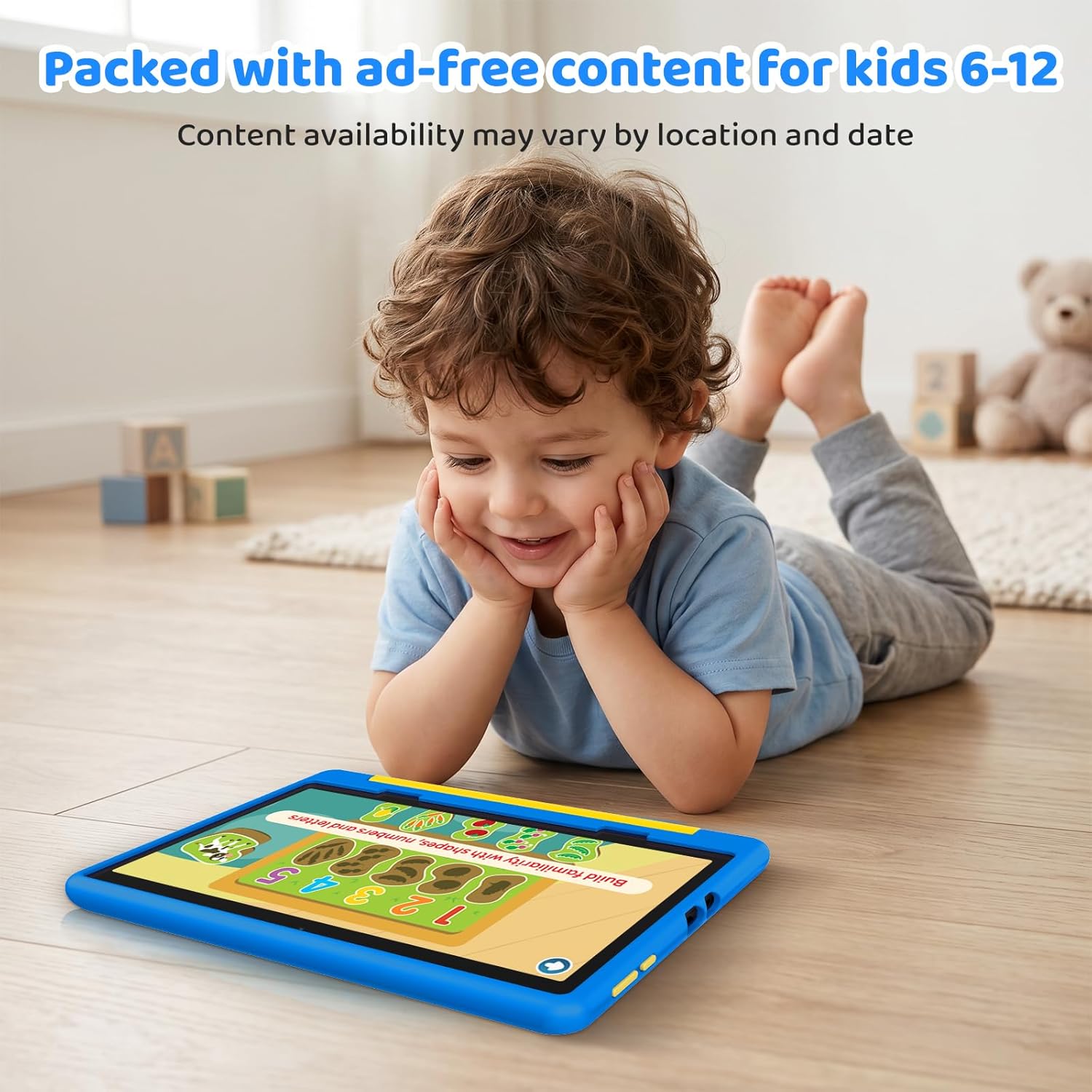 Blue kids tablet on the floor with a colorful game screen