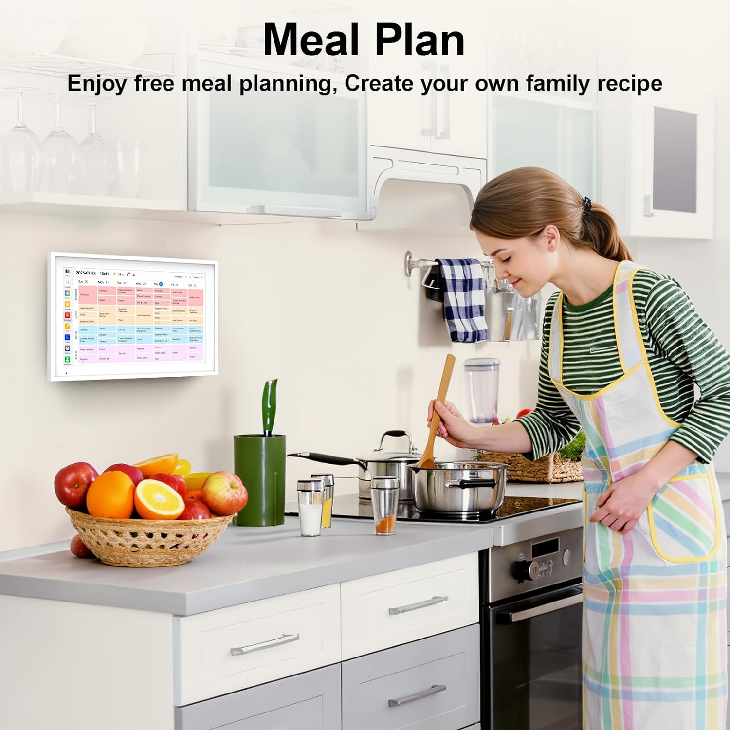 Wall digital calendar showing meal plan list on framed screen in kitchen